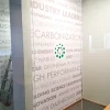 Full-color printed wall wrap installed in an office for interior branding