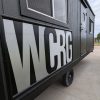 Construction jobsite trailer with custom vinyl graphics installed by Next Signs in Fargo ND